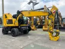Excavadora sobre neumáticos para rieles  CAT M323F